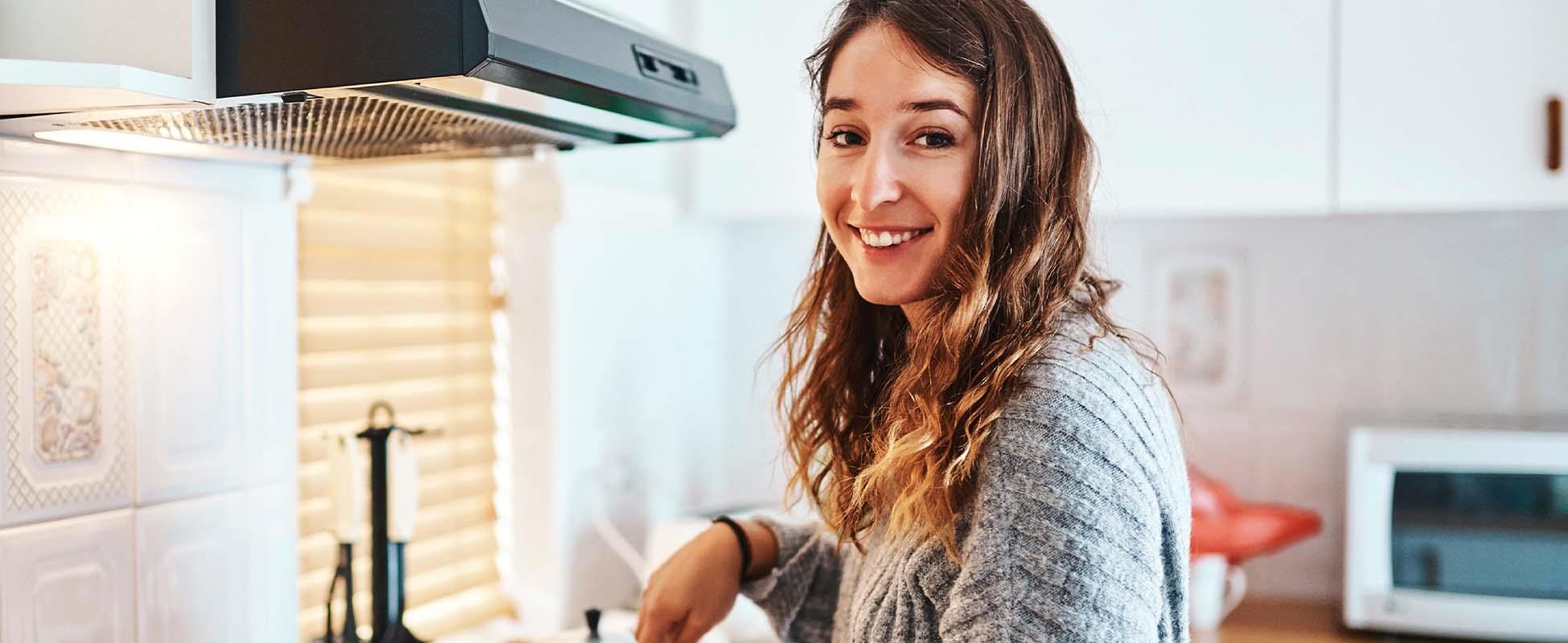 mother and child making love heart shape with hands